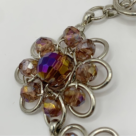 Silver tone open work and iridescent purple glass bead flower link bracelet - Picture 8 of 10